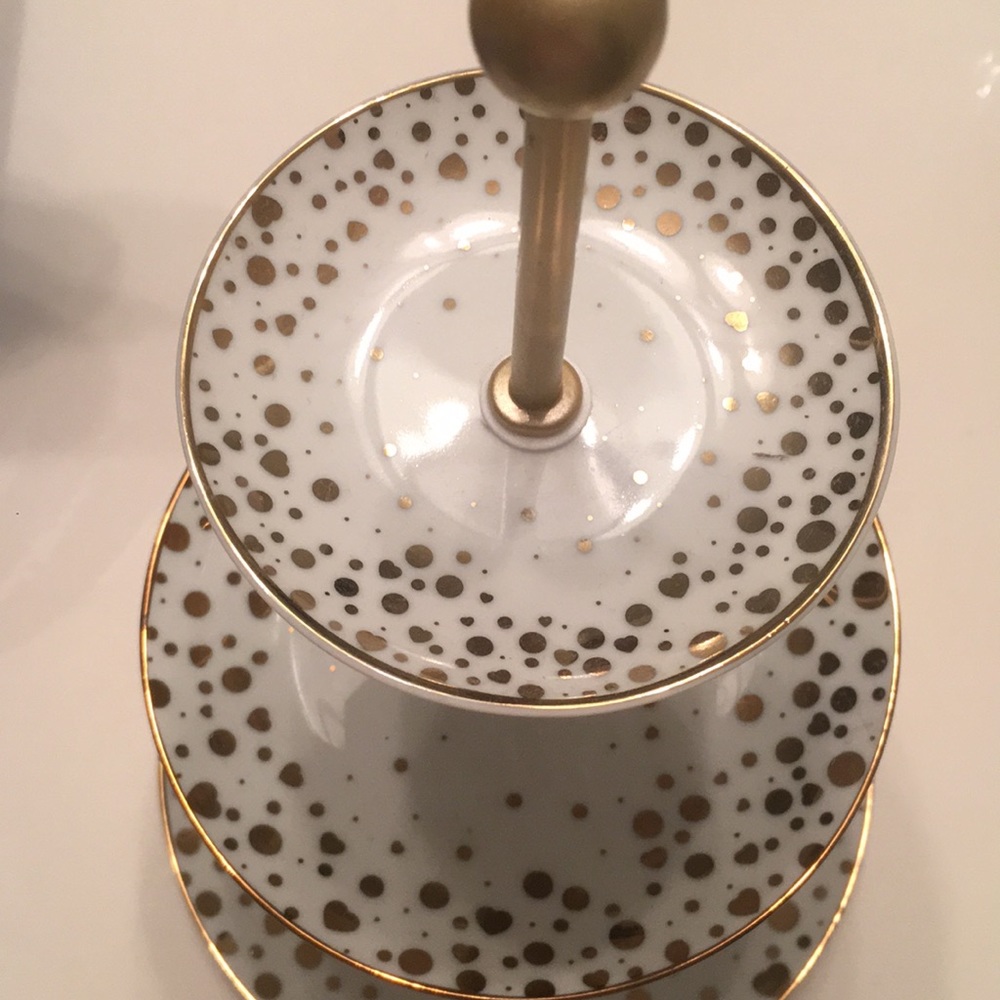 3- teared jewelry holder.